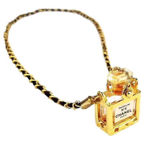 chanel no 5 necklace stones|Chanel no 5 bottle necklace.